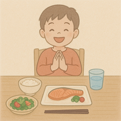 笑顔で食事を始める子
